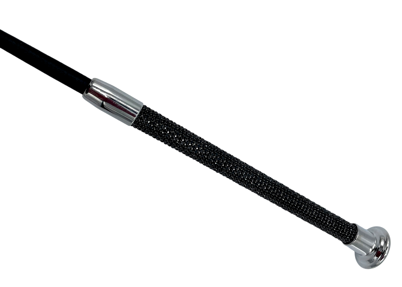 Gerte mit schwarzen Glitzersteinen und silbernen Accessoires